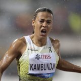 Ditaji Kambundkji dispute les séries du 100 m haies samedi KEYSTONE/JEAN-CHRISTOPHE BOTT